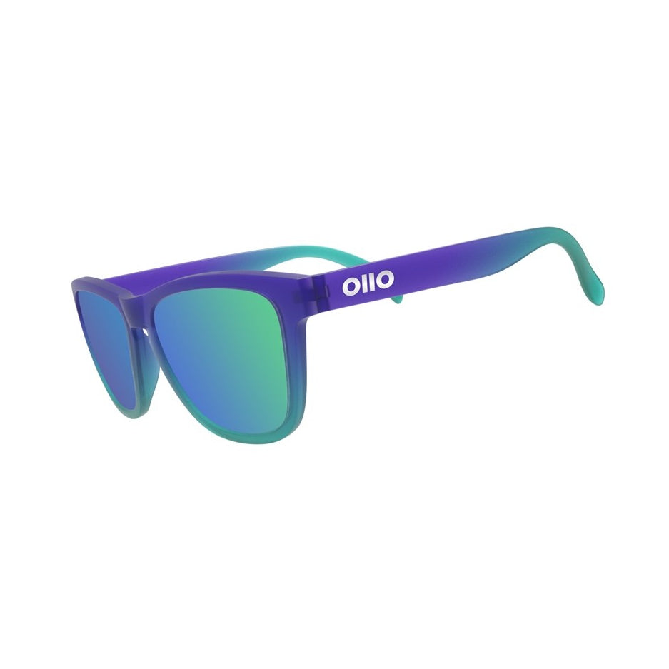 Ollo Clásico Ocean Pulse sunglasses with UV400 polarised lenses and a bold turquoise-blue frame. Crafted for runners and cyclists, these sunglasses deliver lightweight, durable, non-slip comfort and excellent visual clarity for outdoor sport, water adventures, and sunny road rides.