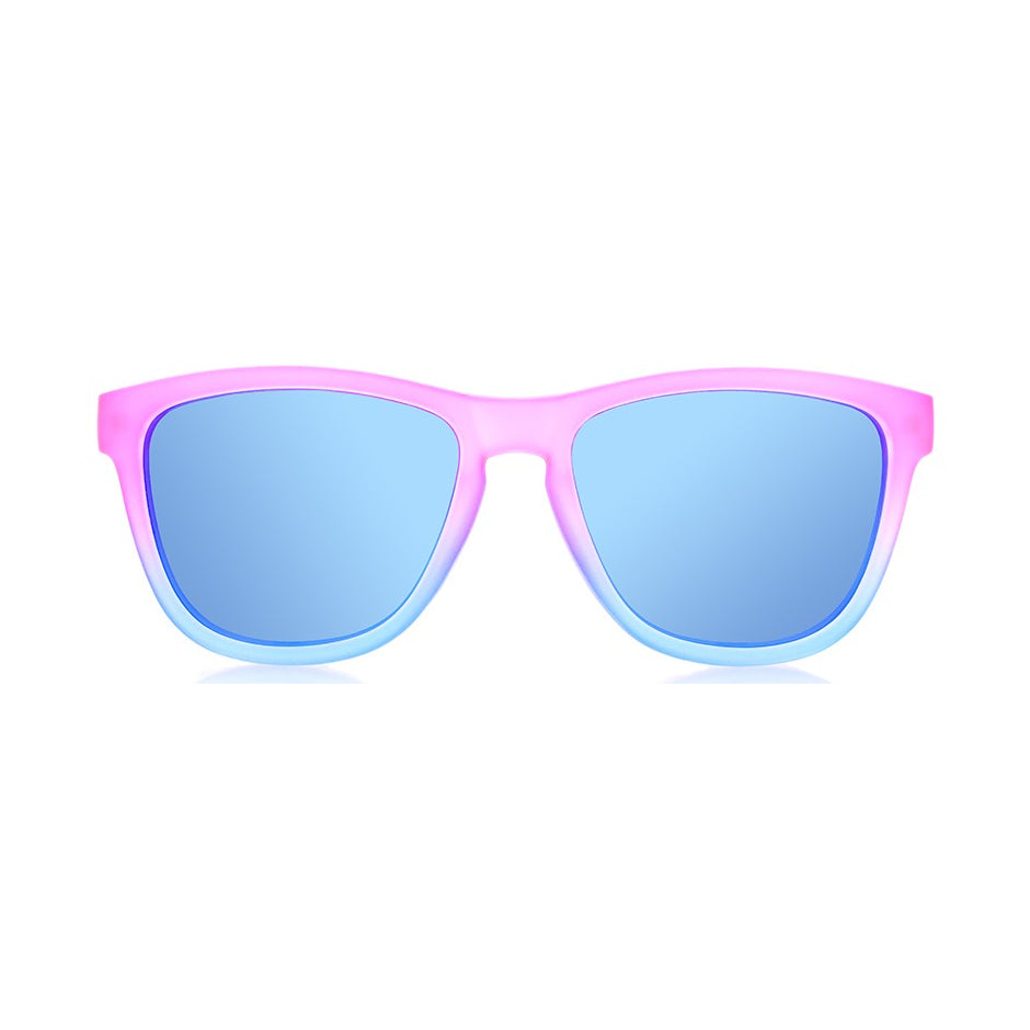 Ollo Clásico Sunset Pop sunglasses with UV400 polarised lenses and a vibrant orange-red fade frame. Perfect for running, cycling, and active outdoor lifestyles, offering non-slip comfort, durable build, and high clarity for training, travel or daily wear.