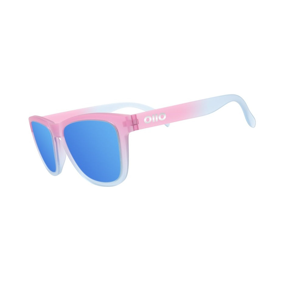 Ollo Clásico Sunset Pop sunglasses with UV400 polarised lenses and a vibrant orange-red fade frame. Perfect for running, cycling, and active outdoor lifestyles, offering non-slip comfort, durable build, and high clarity for training, travel or daily wear.