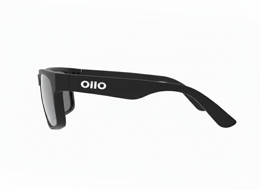 Ollo Summit Shadow sunglasses with UV400 polarised lenses and a sleek dark matte frame. Designed for runners and cyclists tackling sunrise trails and mountain paths, these lightweight, durable sunglasses deliver non-slip grip, high clarity, and comfort in harsh lighting and rugged terrain.