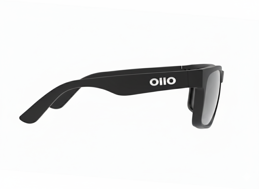 Ollo Summit Shadow sunglasses with UV400 polarised lenses and a sleek dark matte frame. Designed for runners and cyclists tackling sunrise trails and mountain paths, these lightweight, durable sunglasses deliver non-slip grip, high clarity, and comfort in harsh lighting and rugged terrain.