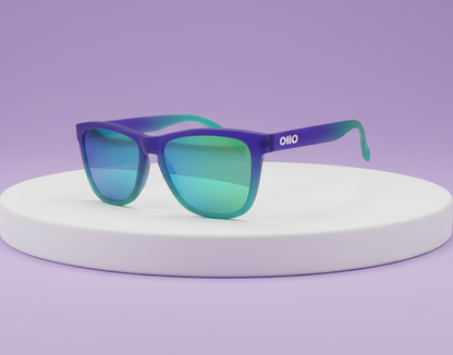 Ollo Clásico Ocean Pulse sunglasses with UV400 polarised lenses and a bold turquoise-blue frame. Crafted for runners and cyclists, these sunglasses deliver lightweight, durable, non-slip comfort and excellent visual clarity for outdoor sport, water adventures, and sunny road rides.