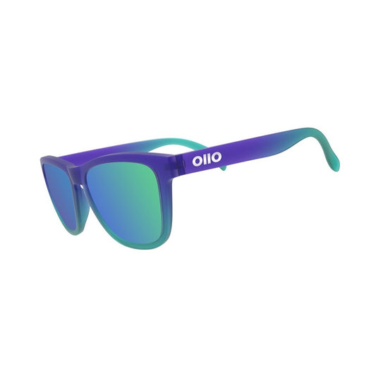 Ollo Clásico Ocean Pulse sunglasses with UV400 polarised lenses and a bold turquoise-blue frame. Crafted for runners and cyclists, these sunglasses deliver lightweight, durable, non-slip comfort and excellent visual clarity for outdoor sport, water adventures, and sunny road rides.