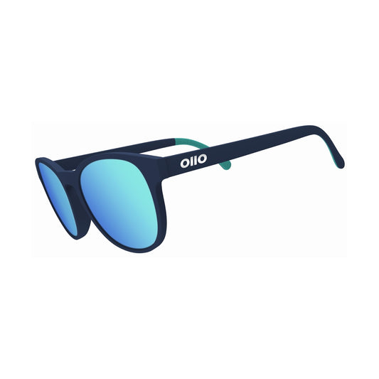 Ollo Pace Midnight Surge sunglasses with UV400 polarised lenses and a deep navy-black frame with subtle contrast details. Crafted for running and cycling, these lightweight, durable sunglasses include a secure non-slip fit and excellent clarity, ideal for night rides, long distances, outdoor training and adventure.