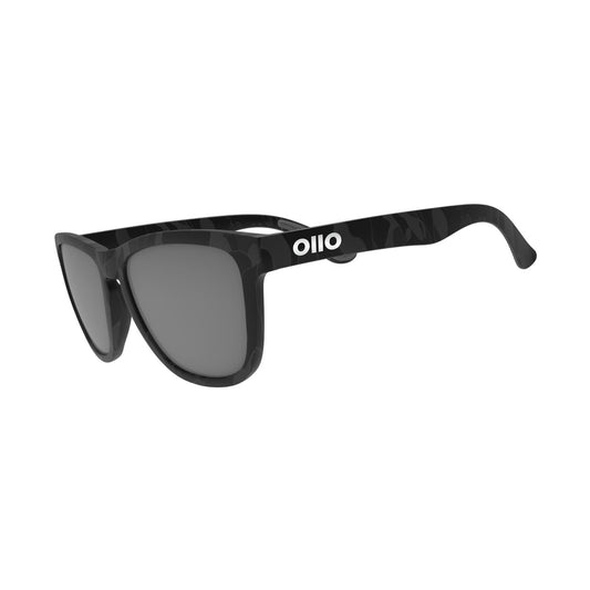 Ollo Stride Phantom sunglasses with UV400 polarised lenses and a sleek matte dark frame. Built for running and cycling, these lightweight, durable sunglasses deliver a firm non-slip fit, excellent clarity and comfort for high-intensity workouts, trail runs, rides and outdoor adventure in varied light.