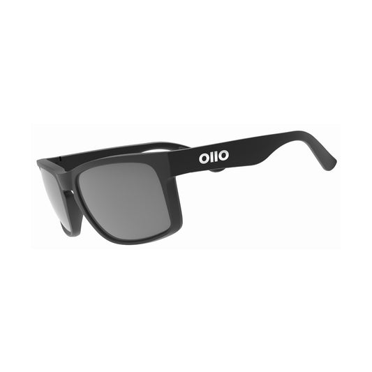 Ollo Summit Shadow sunglasses with UV400 polarised lenses and a sleek dark matte frame. Designed for runners and cyclists tackling sunrise trails and mountain paths, these lightweight, durable sunglasses deliver non-slip grip, high clarity, and comfort in harsh lighting and rugged terrain.